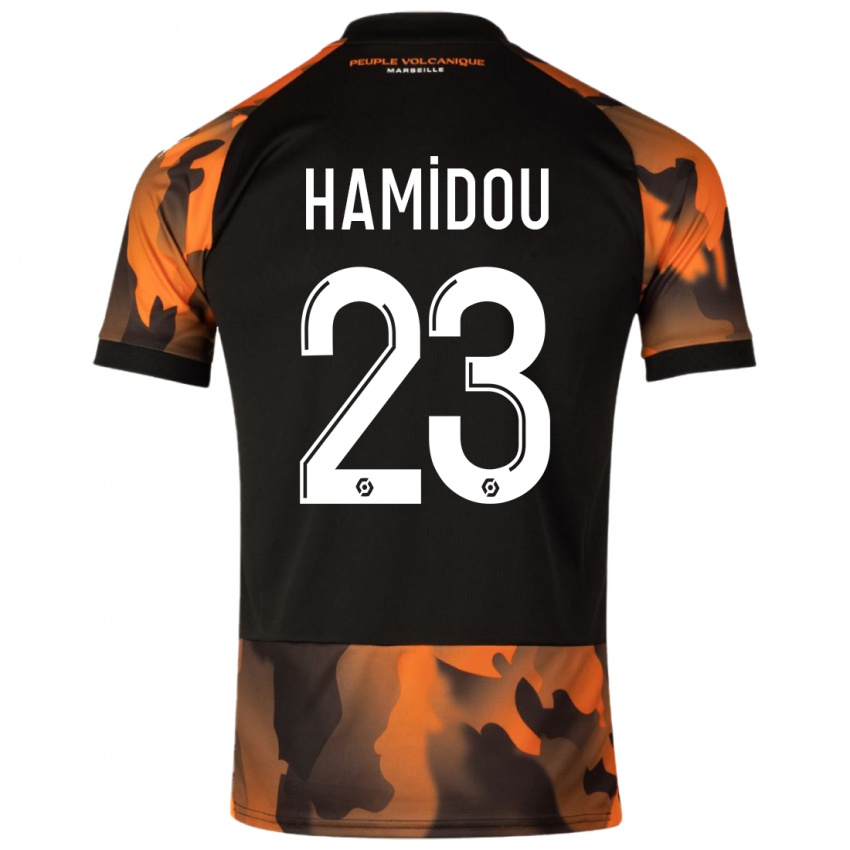 Hombre Camiseta Jamila Hamidou #23 Negro Naranja Equipación Tercera 2023/24 La Camisa Argentina